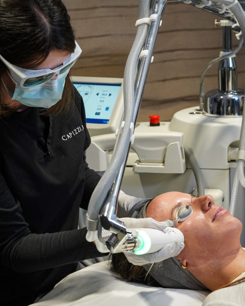 Halo Laser 2 Provider performing HALO laser facial resurfacing for improved tone, texture, and glow.